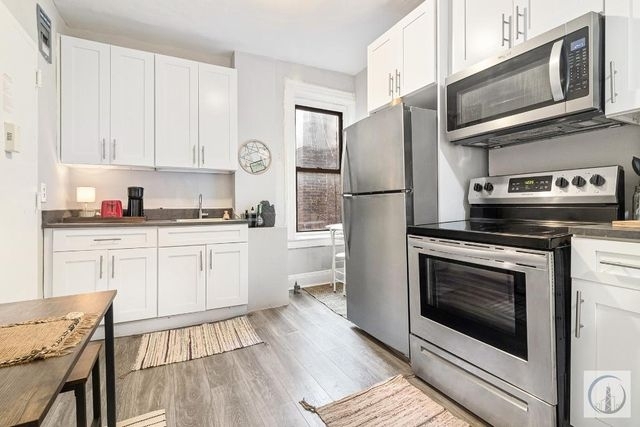 W 52nd St  - Photo 1