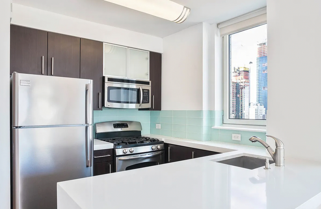 west 37th st  - Photo 0