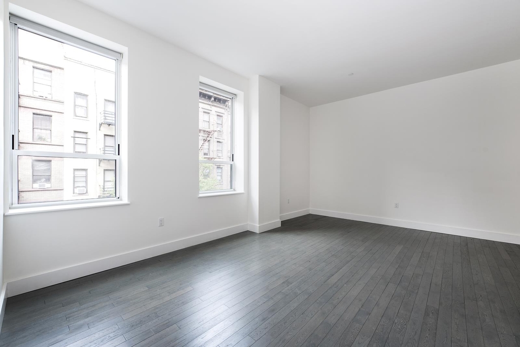 416 W 52nd St - Photo 1