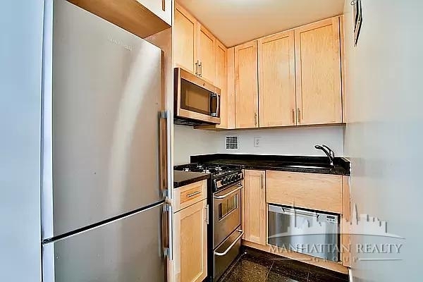 E 36th St - Photo 3