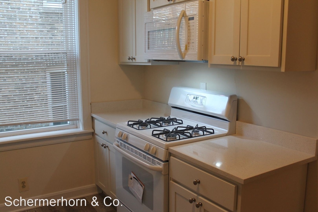 704-10 Hinman Ave. - Photo 3