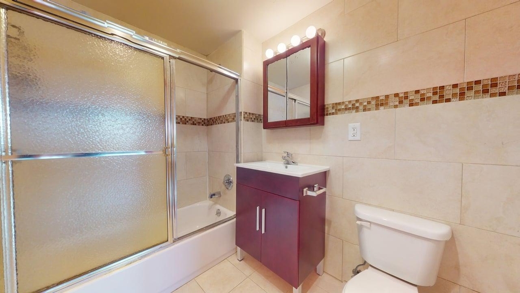 135-23 82nd Avenue, Briarwood NY 11435 - Photo 12