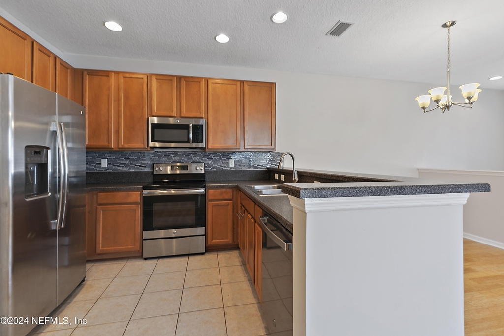 12301 Kernan Forest Boulevard - Photo 7