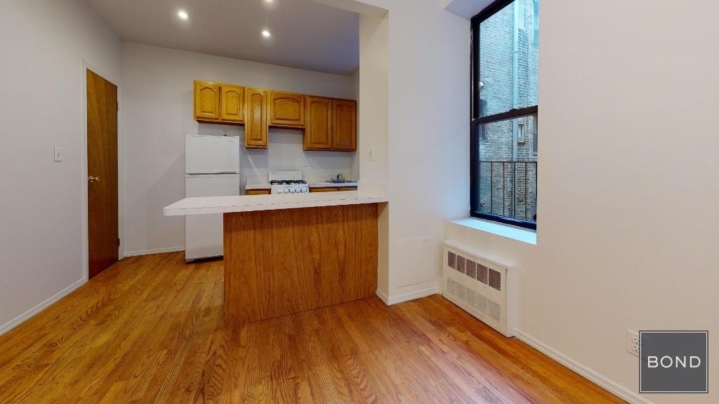 419 East 73rd Street - Photo 1