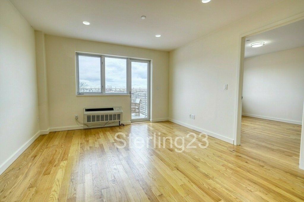 23-15 Astoria Boulevard - Photo 4