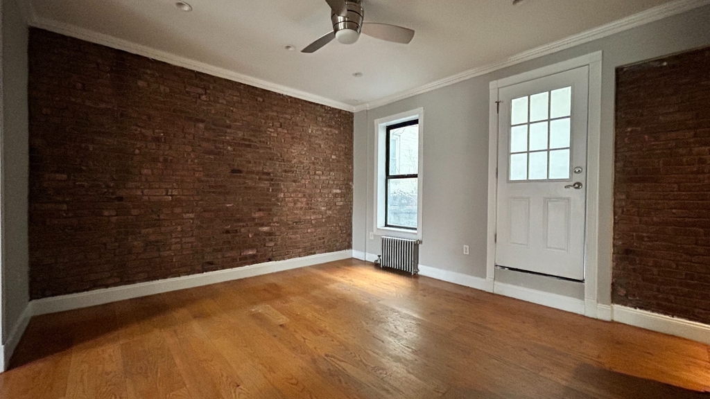 Renovated 3 bedroom apartment on East 100th Street - Photo 1