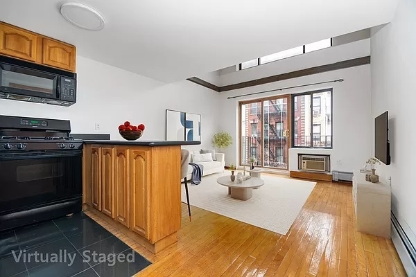 212 East 10th Street - Photo 0