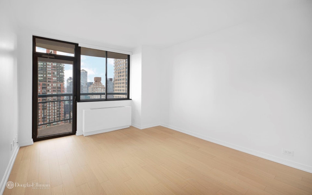 124 W 60th St - Photo 1