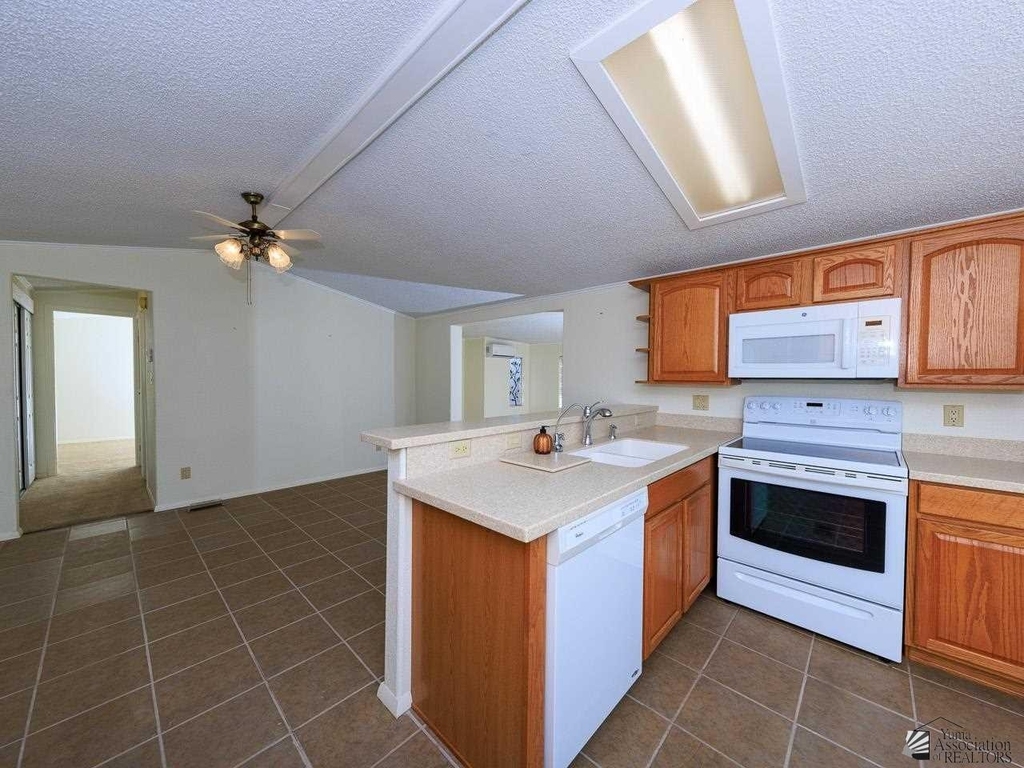 13509 E 49 Dr - Photo 12