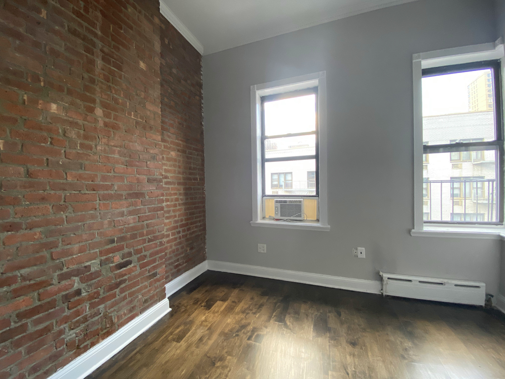 214 E 25th St - Photo 2