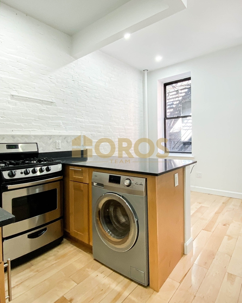 215 East 10th Street - Photo 0