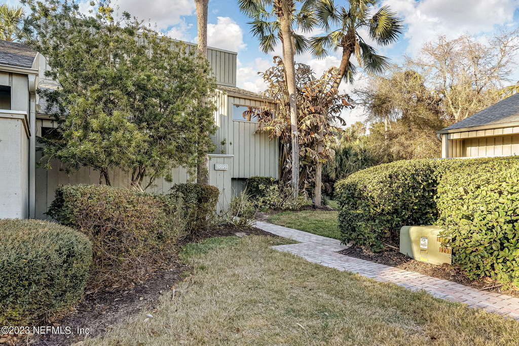 10025 Sawgrass Drive E - Photo 1