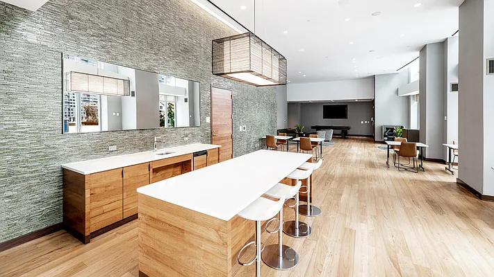4545 Center BoulevardStunning 1 bed apartment featuring a home office area and private balcony with partial views of the East River. This home also features a spacious living area, open kitchen, ample closet space, and southern exposure. - Photo 5