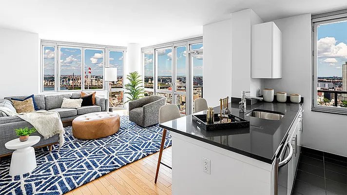 4545 Center BoulevardStunning 1 bed apartment featuring a home office area and private balcony with partial views of the East River. This home also features a spacious living area, open kitchen, ample closet space, and southern exposure. - Photo 0