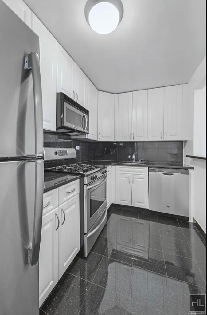 E 65th St - Photo 3