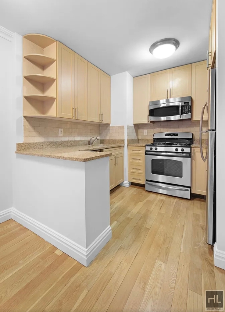 E 65th St - Photo 3
