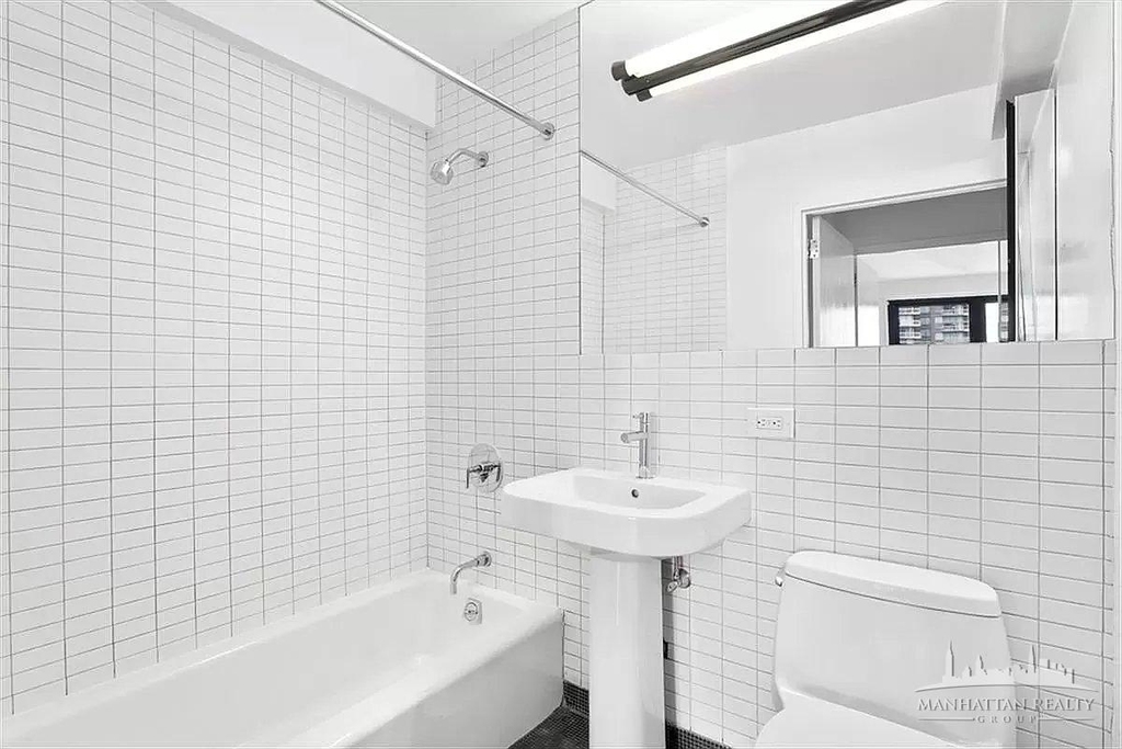 E 39th St - Photo 7