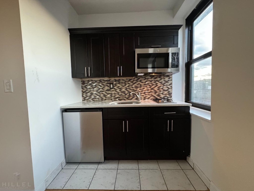 36-14 165th St - Photo 1