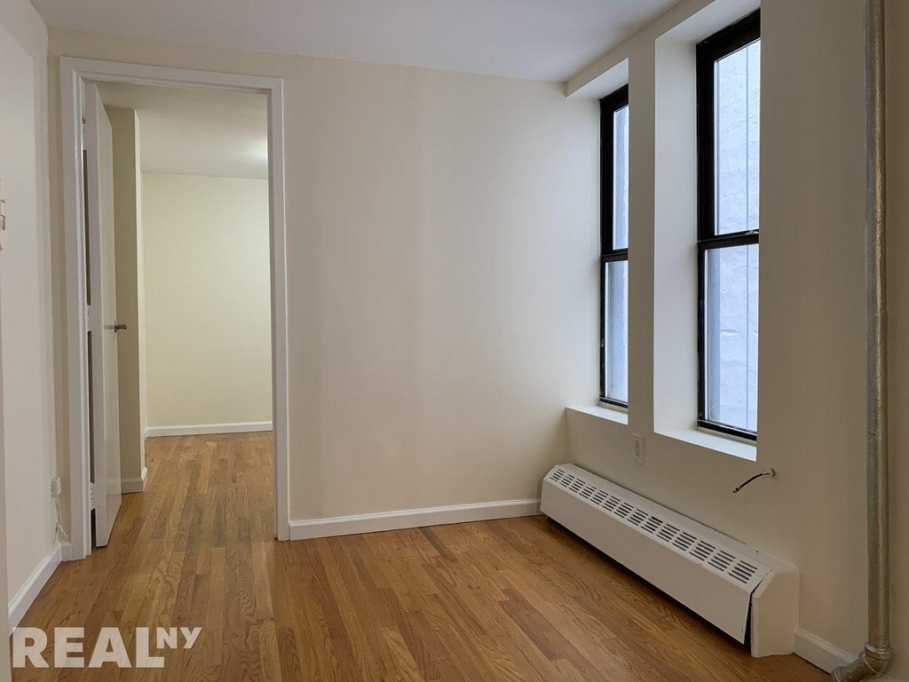 E 80th St - Photo 6