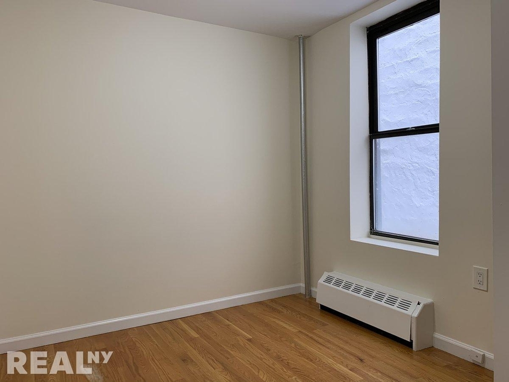 E 80th St - Photo 3