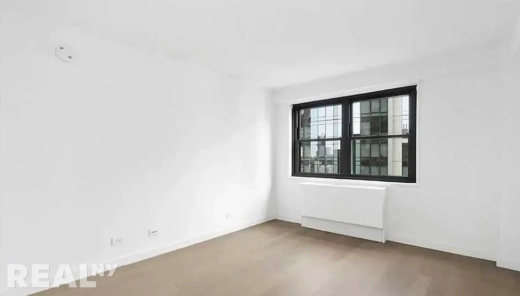 E 39th St - Photo 5