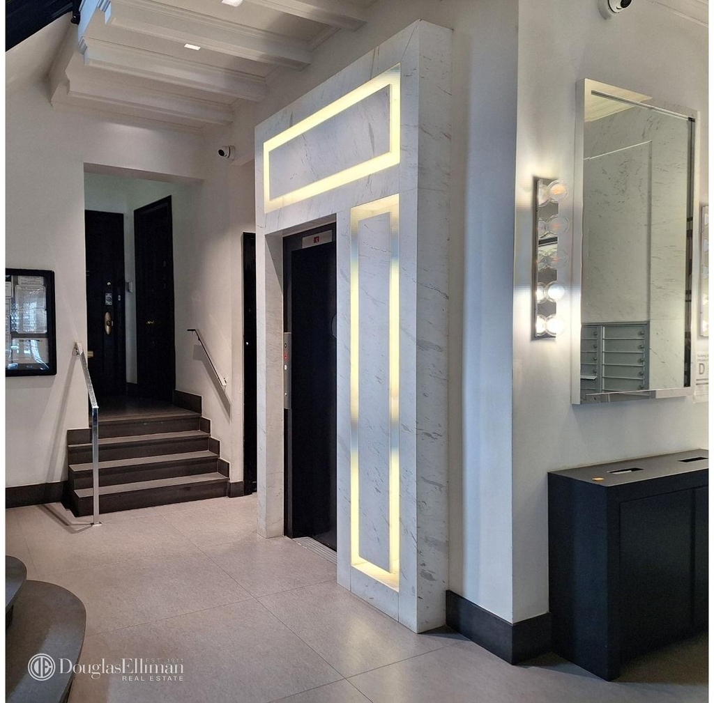 166 W 72nd St - Photo 8