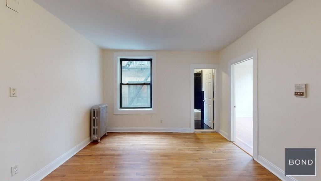 207-209 W 11th Street - Photo 0