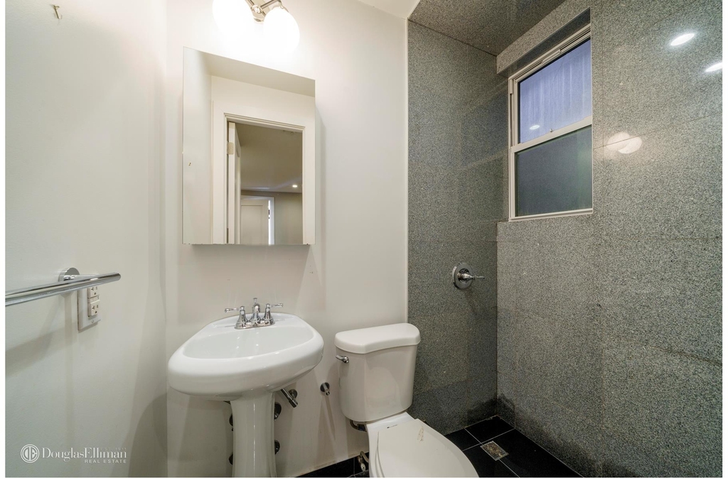 244 W 22nd St - Photo 6