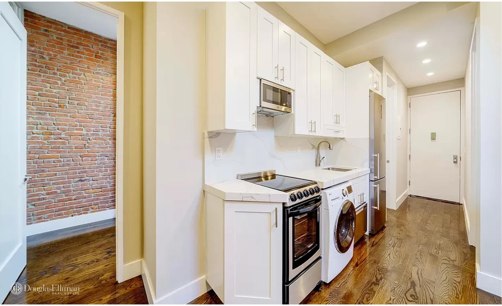 244 W 22nd St - Photo 1
