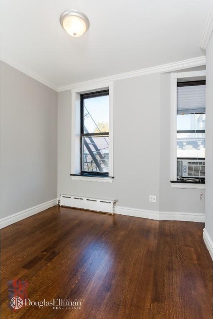336 E 18th St - Photo 2