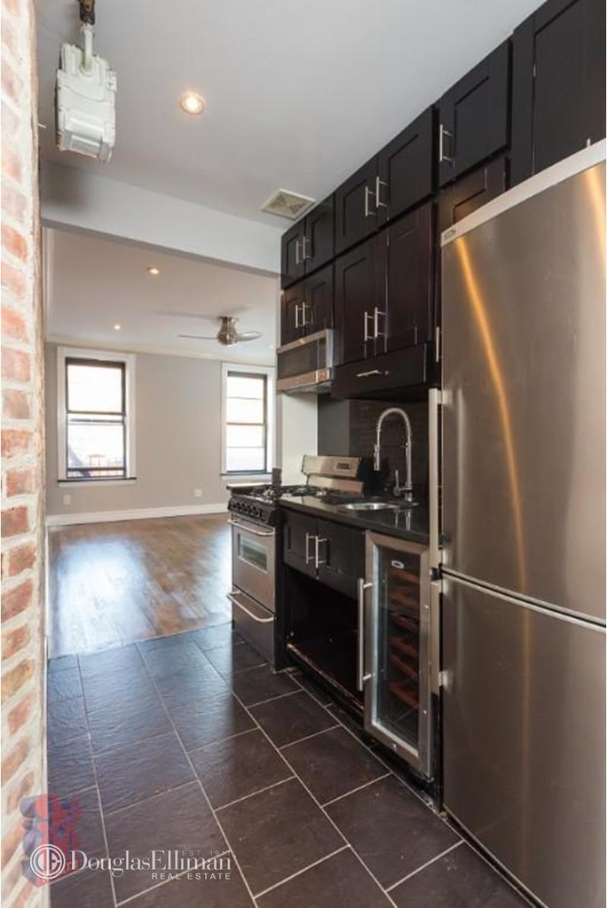 336 E 18th St - Photo 0