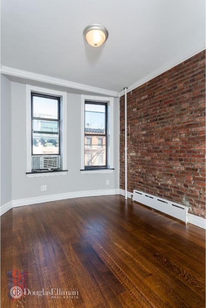 336 E 18th St - Photo 3