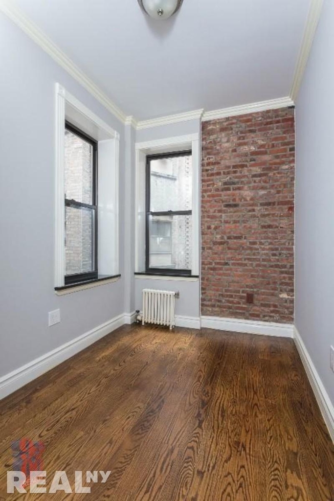 E 8th St. - Photo 2