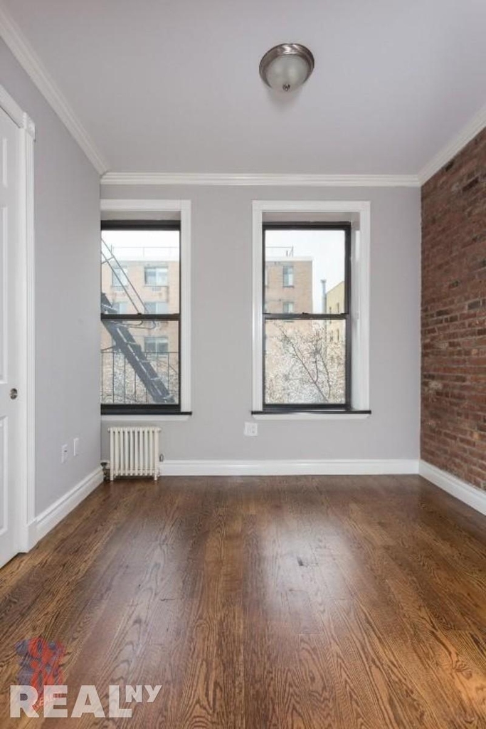 E 8th St. - Photo 3