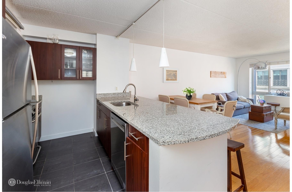 555 W 23rd St - Photo 3