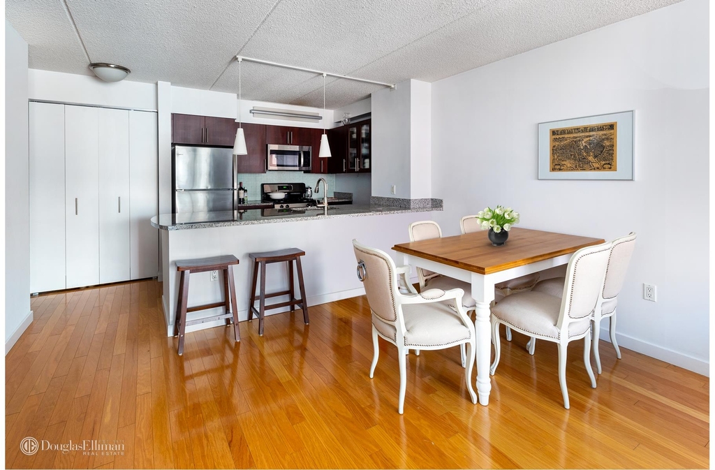 555 W 23rd St - Photo 2