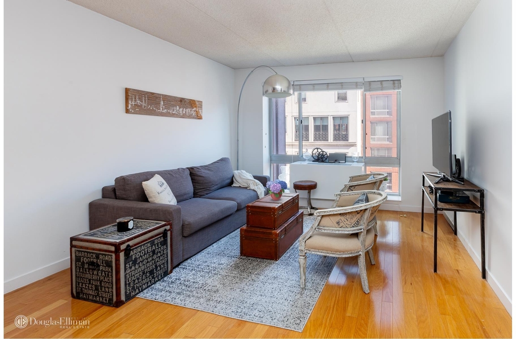 555 W 23rd St - Photo 1