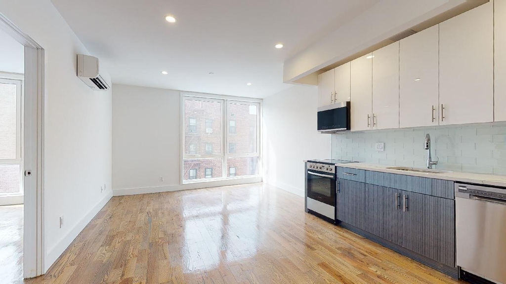 138-28 Queens Boulevard - Photo 1