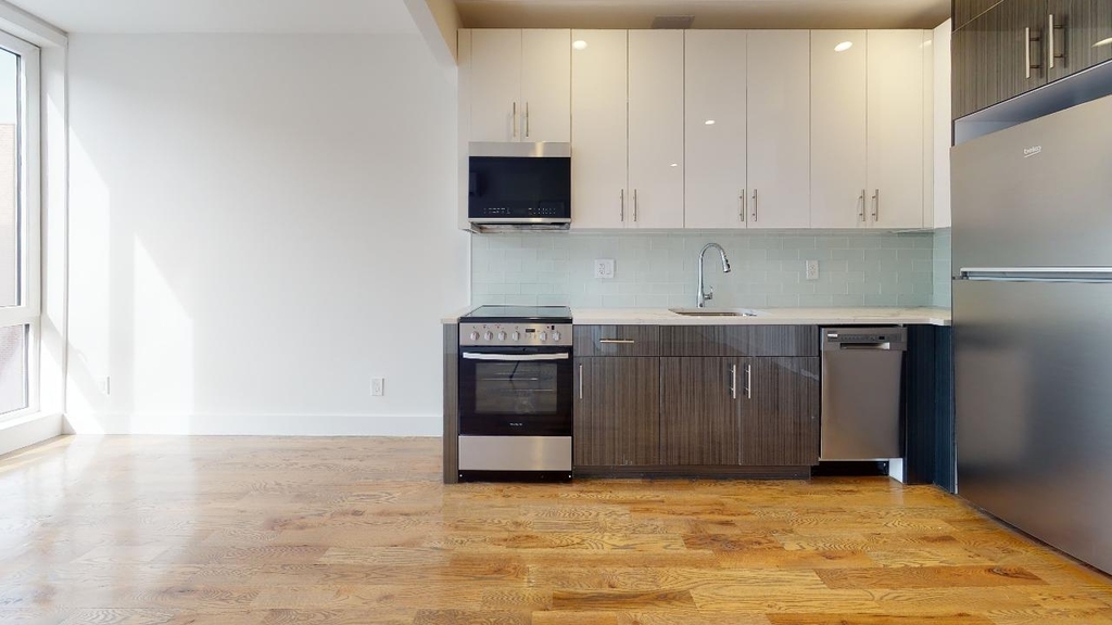 138-28 Queens Boulevard - Photo 3