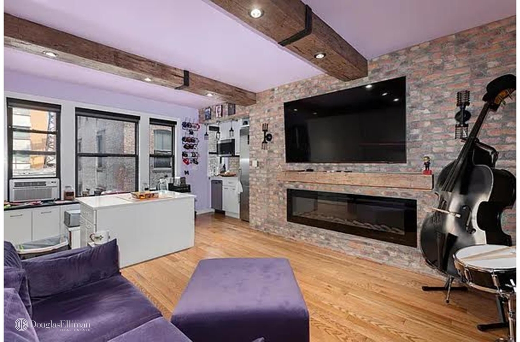 339 E 58th St - Photo 1