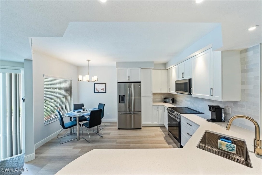 6914 Satinleaf Road N - Photo 10