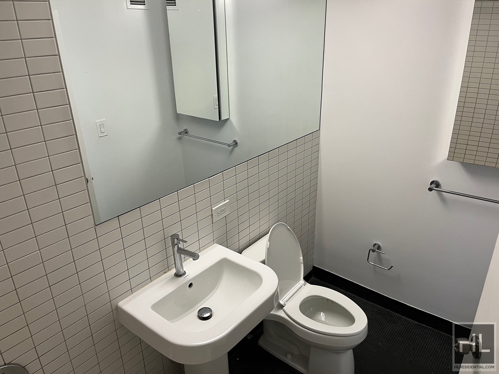 E 39th St - Photo 11