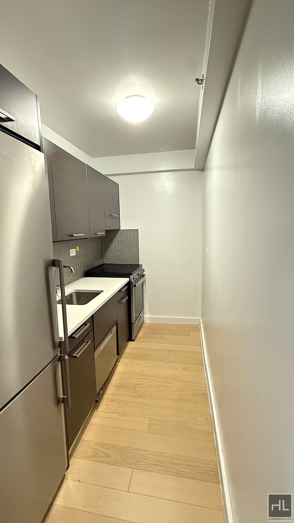 E 39th St - Photo 8