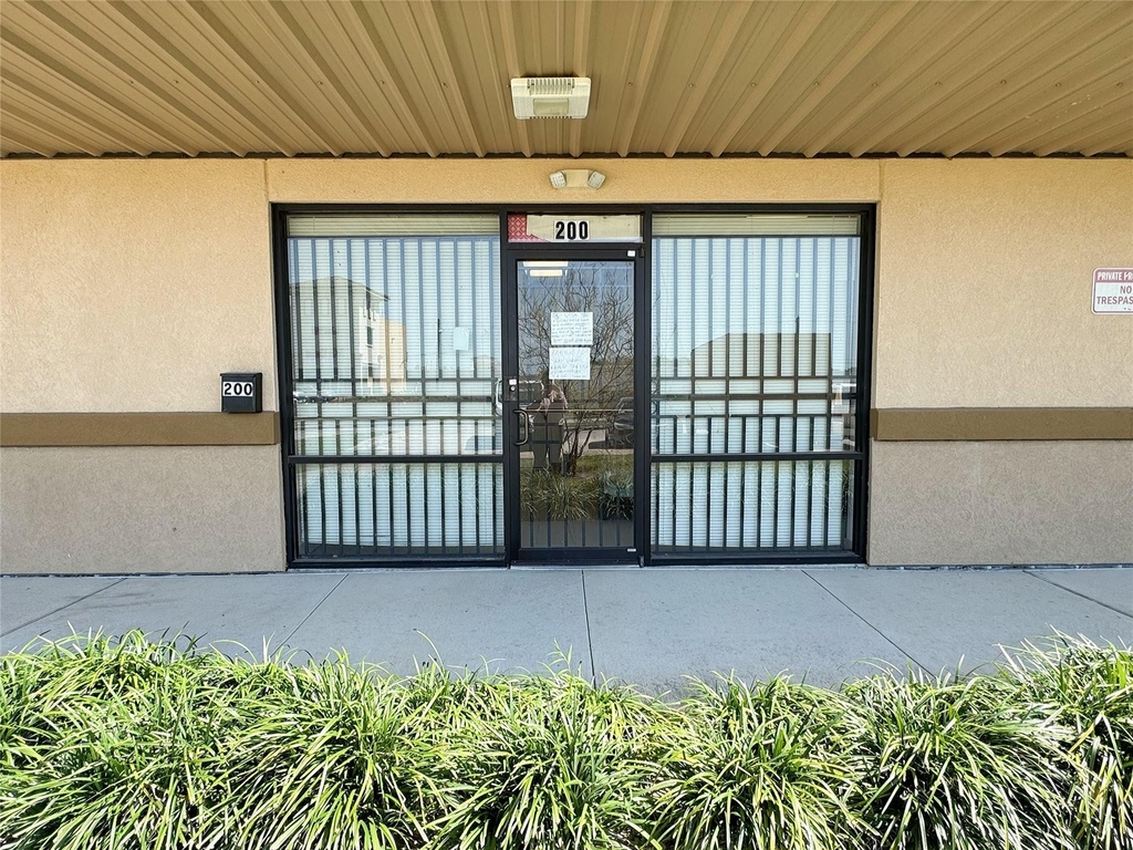 12317 Bellaire Boulevard - Photo 1