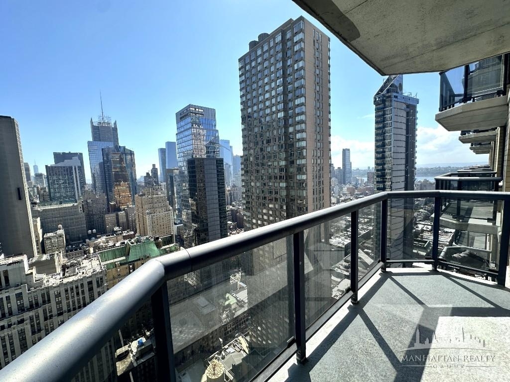 W 48th St and 8th ave - Photo 1