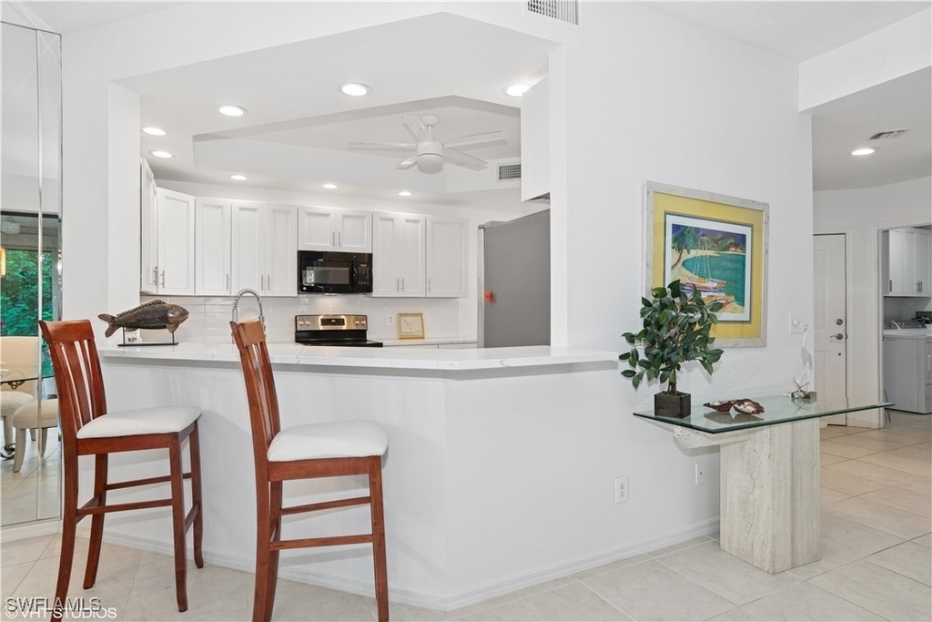 7048 Pelican Bay Boulevard - Photo 7