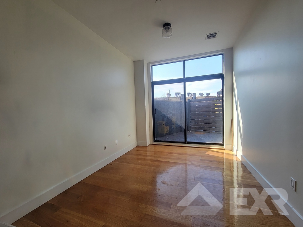 55-27 Myrtle Avenue - Photo 1
