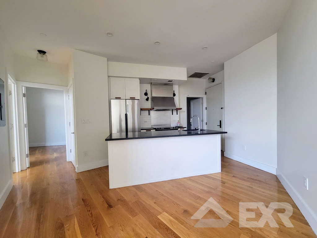 55-27 Myrtle Avenue - Photo 0