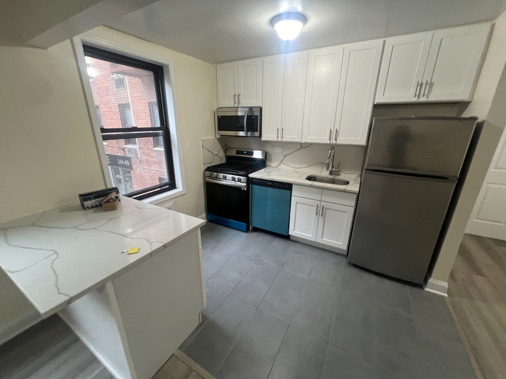 144-45 35th Avenue - Photo 1