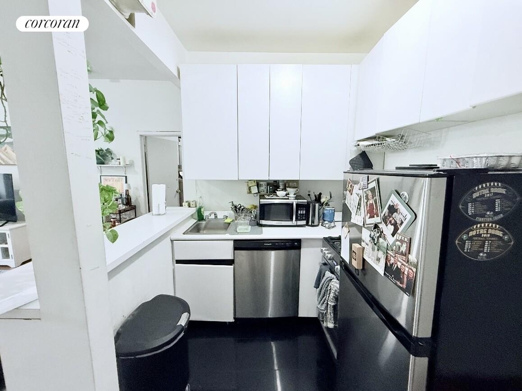 242 East 50th Street, - Photo 2